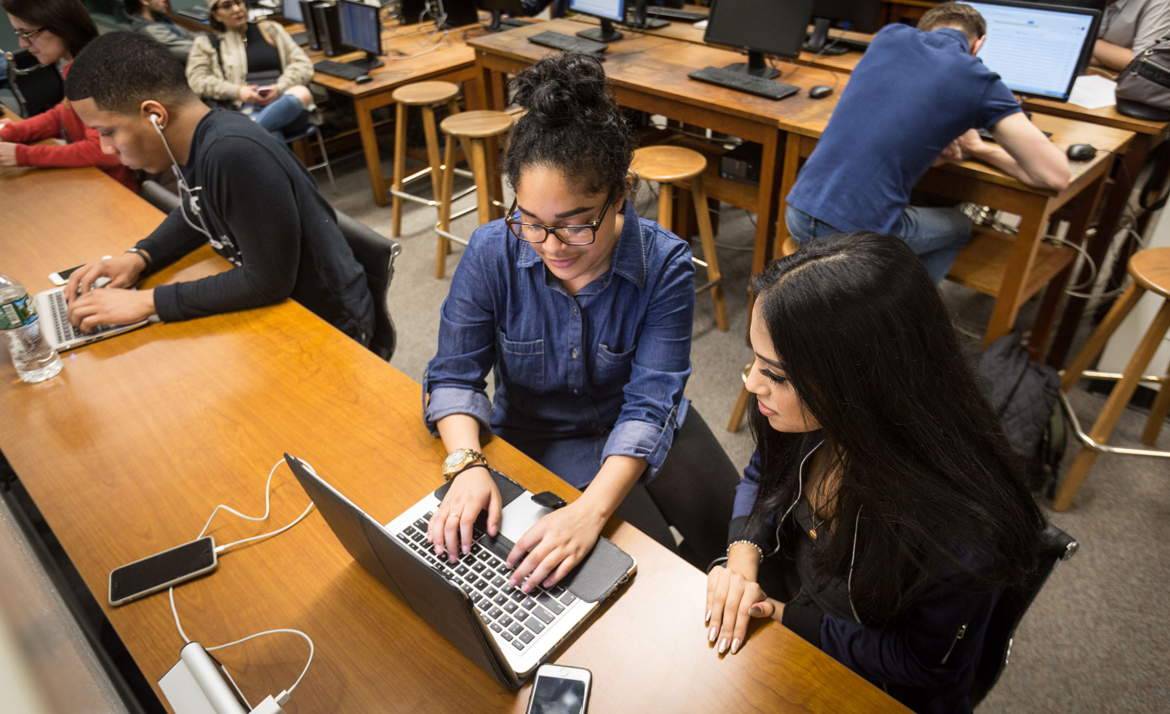 Two students with a laptop