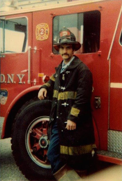 Ronald Bucca in front of fire truck