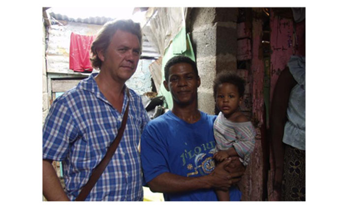 Brotherton with deportee in Santo Domingo, 2003 