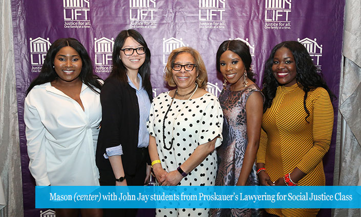 Mason (center) with John Jay students from Proskauer’s Lawyering for Social Justice Class