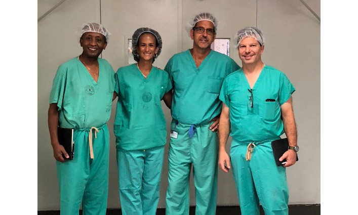 Jodie Roure with medical professionals in Puerto Rico