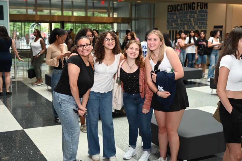 New students posing at check in