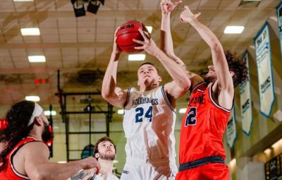 Men playing basketball