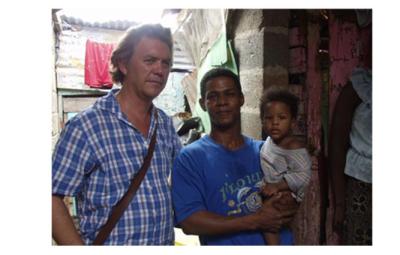 Brotherton with deportee in Santo Domingo, 2003 