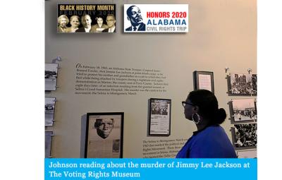 Johnson reading about the murder of Jimmy Lee Jackson at The Voting Rights Museum 